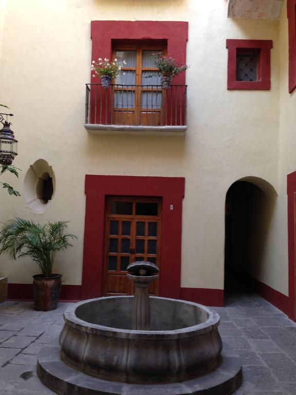 Hotel Casa De La Palma Travel Пуэбла Номер фото